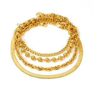 4-piece vintage gold layered chain bracelet set featuring snake, twist and cuban styles