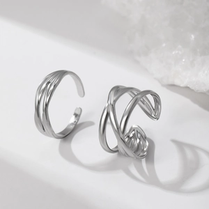 Minimalist silver geometric layered rings with cross-weave and triple-line design