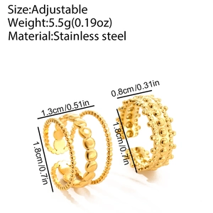 Detailed view of adjustable golden stainless steel rings with unique geometric textures