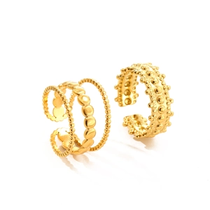 Adjustable gold plated stainless steel rings featuring beaded layers and dome stud textures