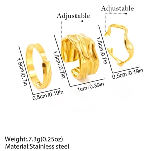 Detailed view of three adjustable gold stainless steel rings with irregular textures