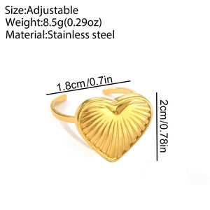 Detail view of adjustable gold heart ring with stainless steel material specifications