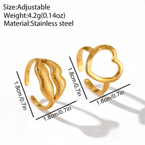 Detail view of adjustable gold stainless steel rings with heart and textured lip motifs