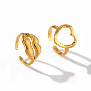 Minimalist gold heart and lip shaped open rings set in polished stainless steel
