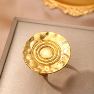 Irregular geometric gold ring in 316 stainless steel with textured wavy matte finish