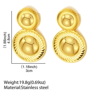 Detail view of large gold stainless steel tiered earrings with textured woven borders