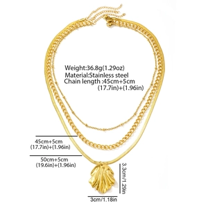 Detailed view of triple-layer gold necklace showing shell pendant and chain dimensions