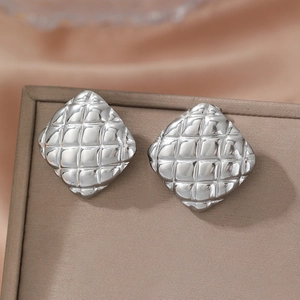 Elegant silver square quilted stud earrings with polished lava metal texture for women
