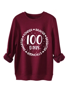 Close-up of the thick burgundy sweatshirt with 100 Days printed white circular graphic