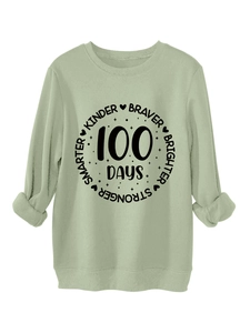 Detail of light green sweatshirt showing thick cotton fabric and 100 Days printed graphic