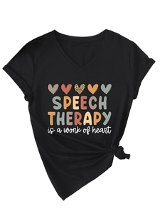 Detail view of V-neck black T-shirt with heart print and Speech Therapy text