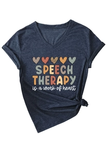 Close-up of V-neck T-shirt with heart graphics and Speech Therapy work of heart text
