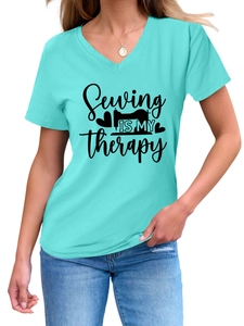 Detail of Sewing is my Therapy print on a mint green V-neck cotton t-shirt for women