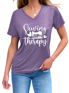 Detail of purple V-neck T-shirt with Sewing is my therapy print and heart pattern