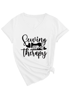 Detail of V-neck white cotton T-shirt with sewing print and stylish side knot hem