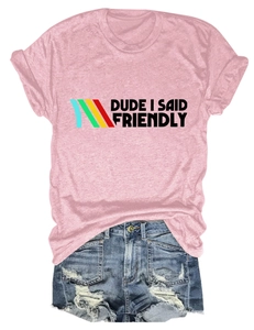 Pink drop shoulder T-shirt with 'DUDE I SAID FRIENDLY' print and ripped denim shorts
