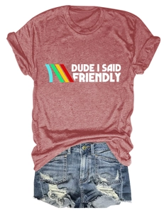 Detail of red crewneck t-shirt with Dude I Said Friendly print and ripped denim shorts