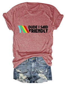 Close-up of text print on heather red t-shirt paired with distressed denim shorts