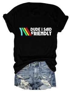 Detail of black cotton T-shirt with DUDE I SAID FRIENDLY print and ripped denim shorts