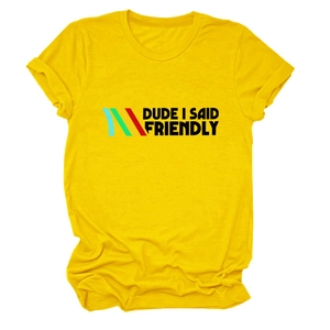 Detail of yellow cotton t-shirt featuring DUDE I SAID FRIENDLY text print and crew neck