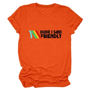 Close-up of orange cotton t-shirt with DUDE I SAID FRIENDLY slogan and striped graphic