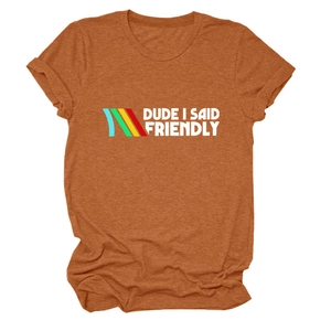 Detail of caramel orange t-shirt featuring 'DUDE I SAID FRIENDLY' print and knit texture