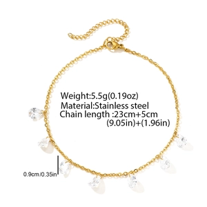 Detail of golden stainless steel anklet with pear-shaped cubic zirconia charms