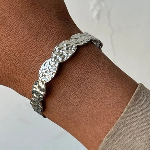 Retro stainless steel open cuff bracelet with hammered texture and irregular wavy edges