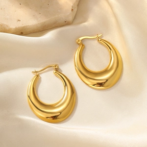 Modern minimalist gold hollow hoop earrings with thick teardrop design for women
