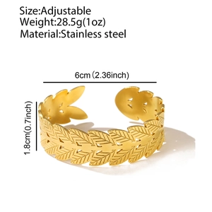 Macro detail of 18K gold plated stainless steel leaf ring showing dimensions and weight