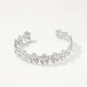 Polished silver floral cuff open bracelet with textured hammered metal finish for women