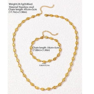 Detail of gold stainless steel coffee bean chain necklace and bracelet jewelry set