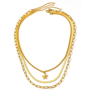 Three-layer gold necklace set featuring paperclip chain, snake chain, and starfish pendant