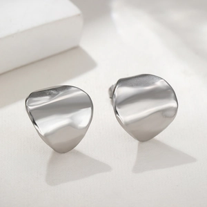 Polished silver stainless steel irregular curved stud earrings with minimalist modern design