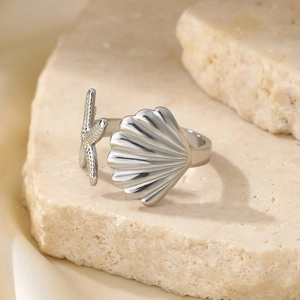 Adjustable silver sea shell and starfish open ring with polished metallic finish