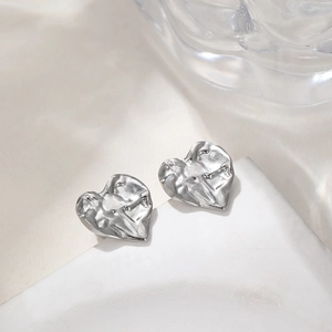 French vintage silver heart studs with textured water ripple surface in stainless steel