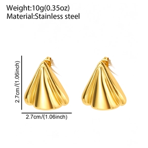 Macro view of gold stainless steel shell earrings showing weight and size details