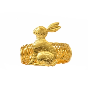 Détail d'un embrasse de rideau lapin doré avec texture de fourrure et anneau en fil métallique