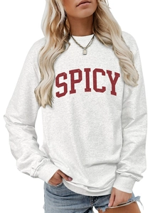 Detail of grey crewneck sweatshirt with red SPICY text and ribbed sleeve cuffs