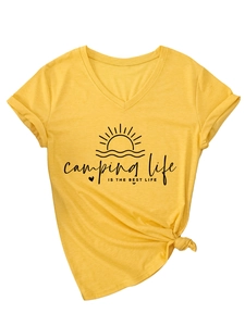 Detail of yellow V-neck T-shirt with camping life print and stylish side knot design
