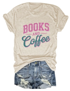 Flat lay of beige Books and Coffee T-shirt paired with cuffed denim shorts on white background