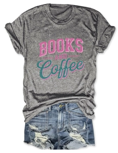 Flat lay of gray Books and Coffee t-shirt and blue distressed denim shorts set