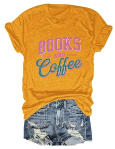 Flat lay of mustard yellow cotton T-shirt with Books and Coffee print and denim shorts