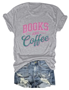 Detail view of Books and Coffee graphic tee tucked into distressed denim shorts