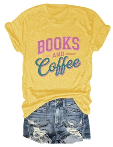 Flat lay of mustard t-shirt with Books and Coffee print and ripped denim shorts
