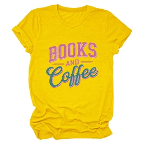 Detail of Books and Coffee typography on yellow crew neck cotton t-shirt with flat lay design