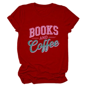 Close-up of Books and Coffee typography on a red cotton crew neck t-shirt for women