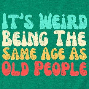 Macro detail of the vintage text print on green knit fabric of the graphic t-shirt