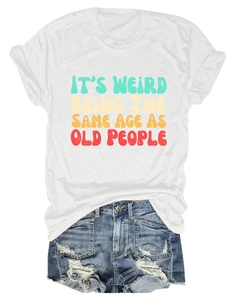 Flat lay of white cotton T-shirt with retro text and distressed denim shorts outfit