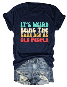 Detail of navy t-shirt with vintage text print and distressed denim shorts set